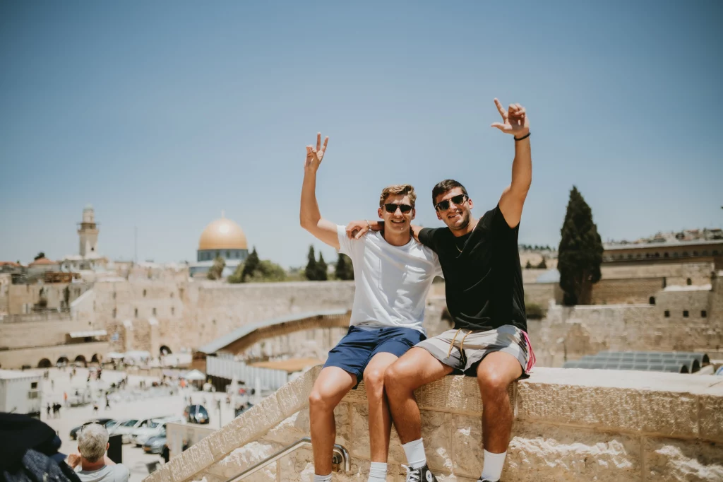 Students on a Birthright trip pose in Jerusalem.