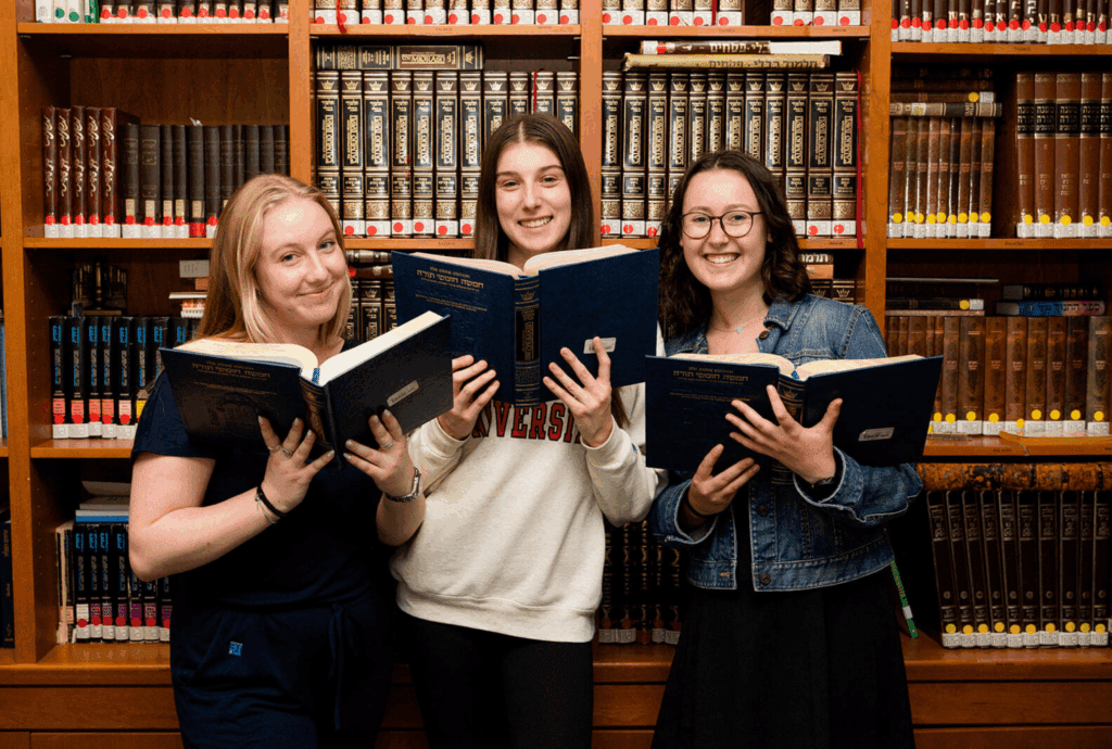 Students holding books