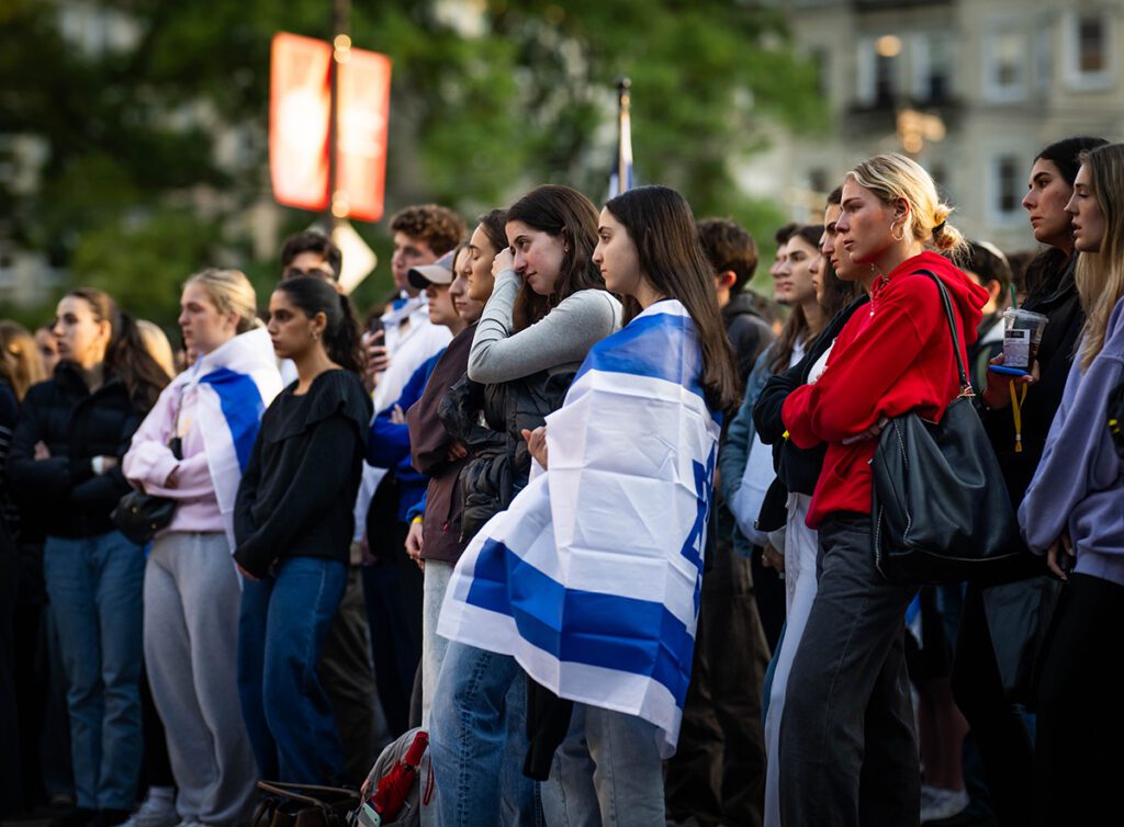 The BU community gathers on Marsh Plaza for a ceremony of remembrance on the three year anniversary of the attack on Israel by Hamas that killed more than 1,200 people. 

